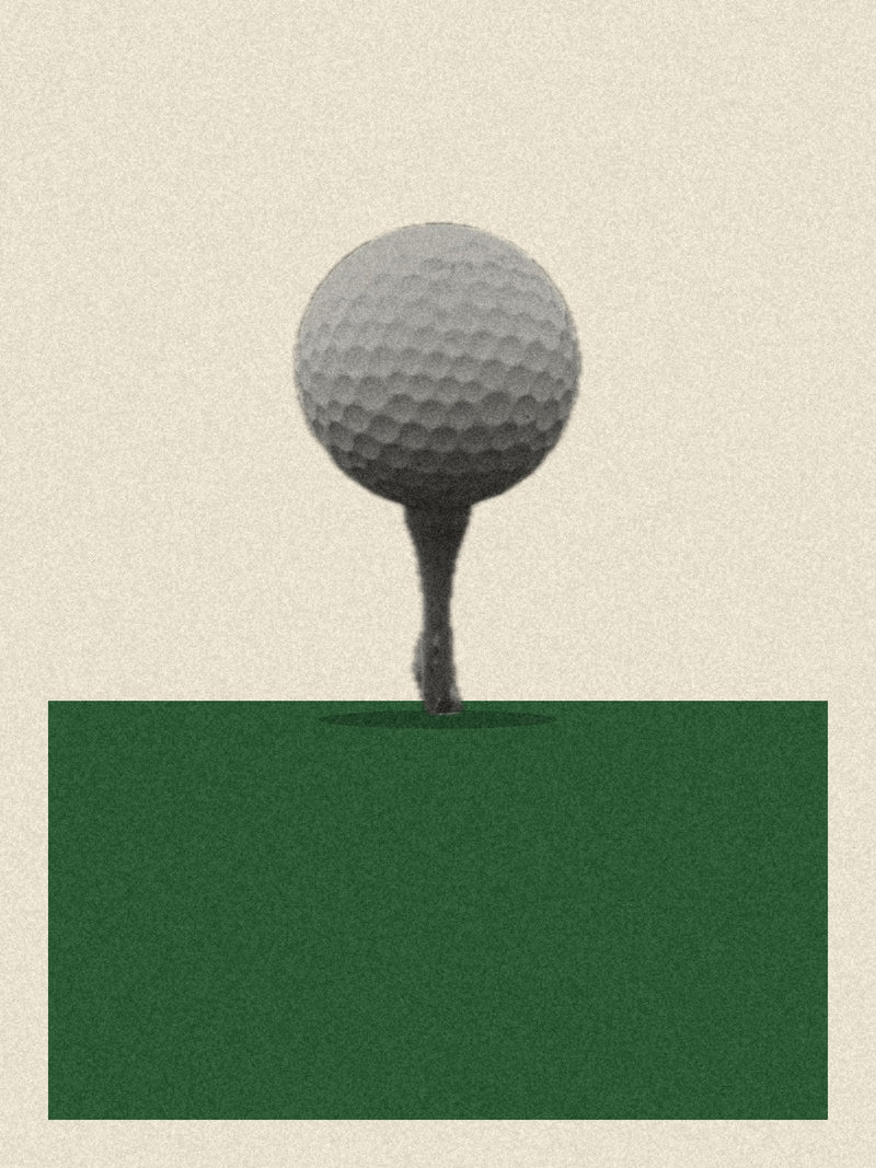 Golf ball on a tee, grainy black-and-white cut-out on a green block